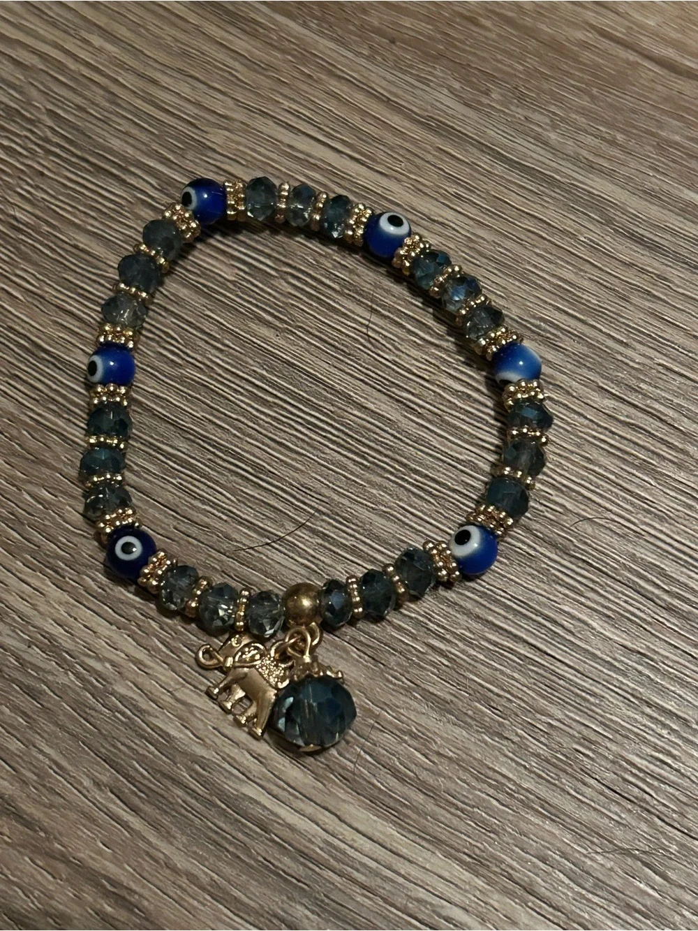 Blue Beaded Evil Eye Stretch Bracelet with Gold Elephant Charm